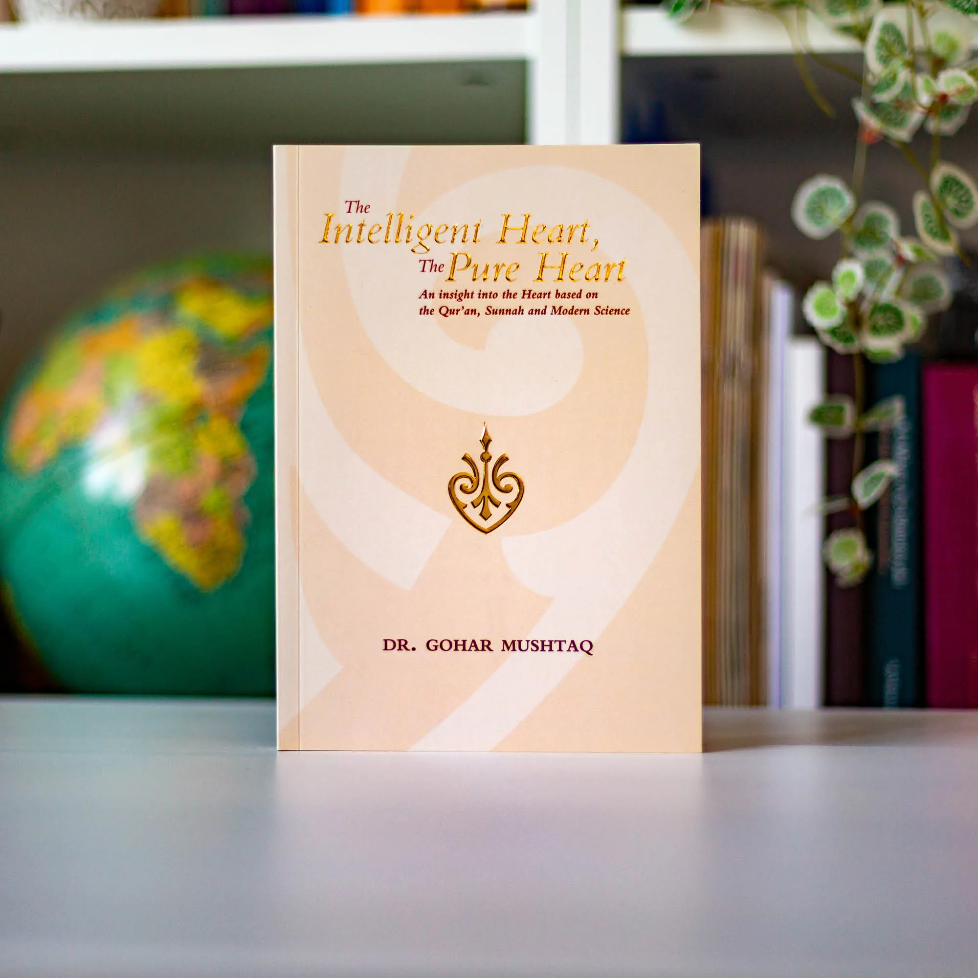 Upright book in library of Intelligent Heart, Pure Heart by Gohar Mushtaq. Purification of the heart by Ta-Ha Publishers