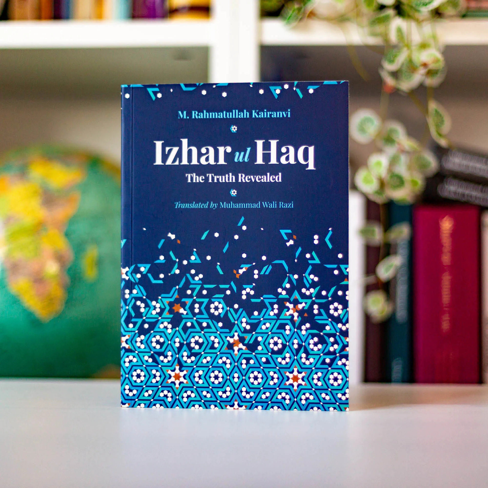 Upright book in library of Izhar ul Haq, The Truth Revealed by Kairanvi, Wali Razi. Islamic study of Bible by Ta-Ha Publishers