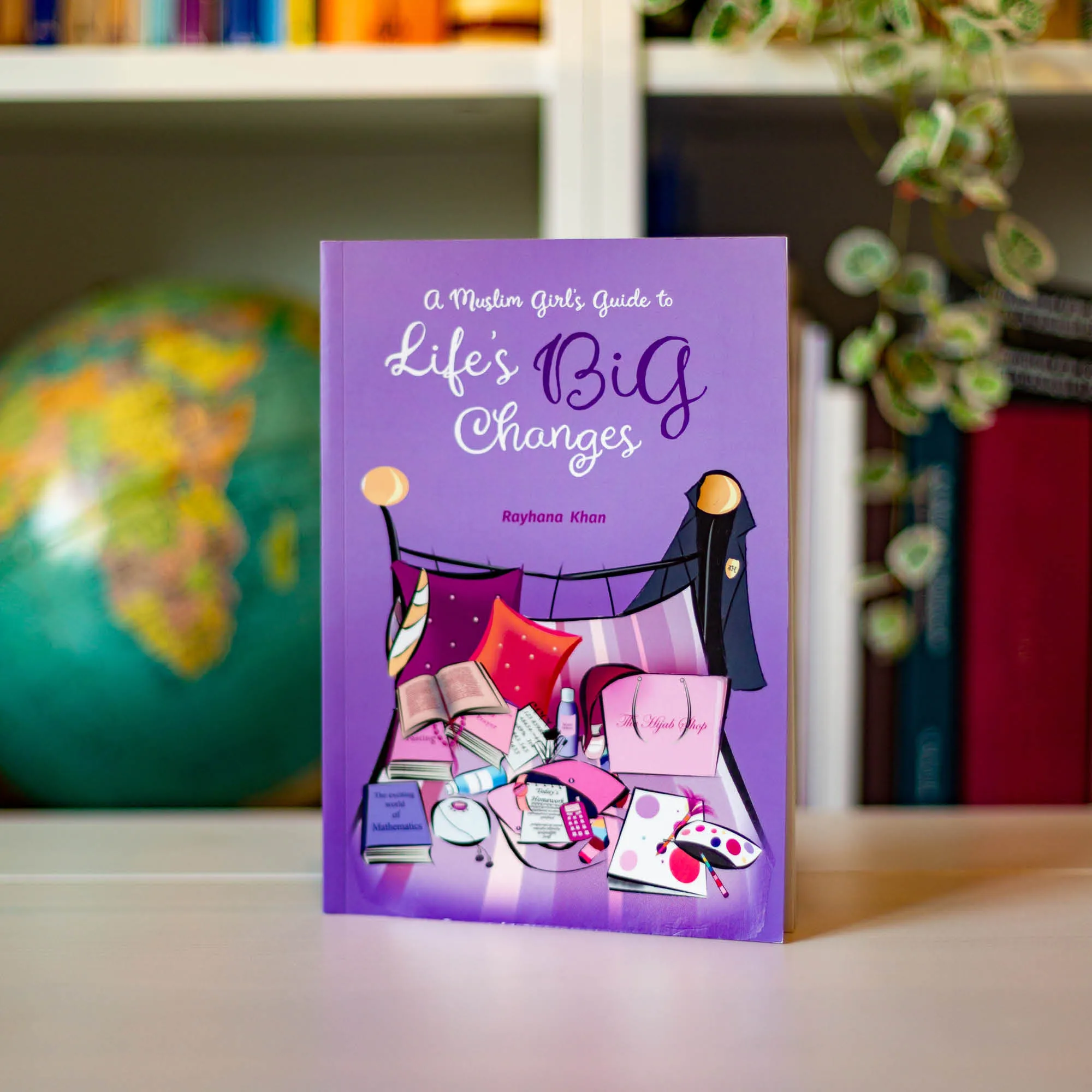Upright book in library of A Muslim Girl’s Guide to Life’s Big Changes by Rayhana Khan. Muslim girl’s puberty guide by Ta-Ha Publishers