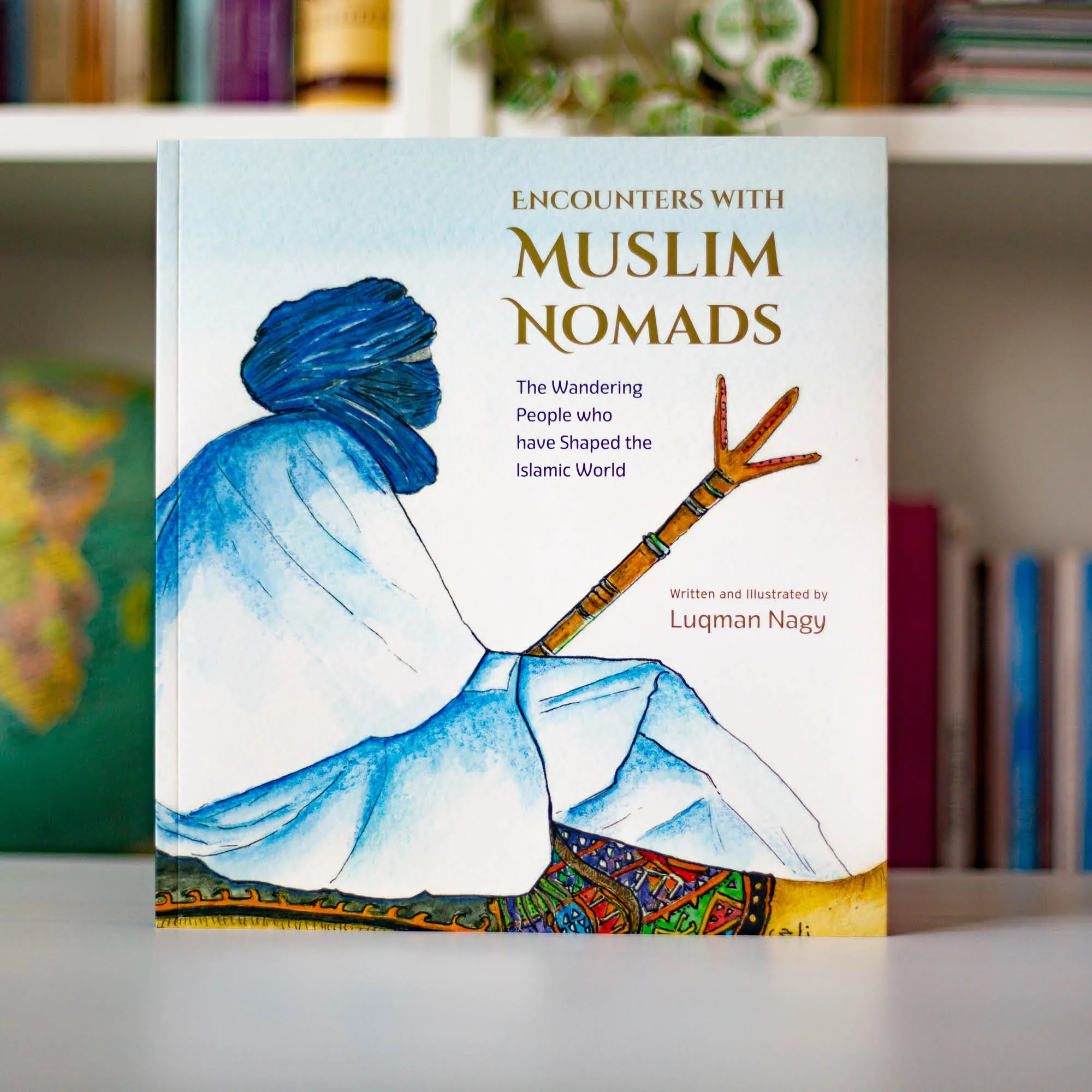 Upright book in library of Encounters with Muslim Nomads by Luqman Nagy. Islamic history and geography book by Ta-Ha Publishers