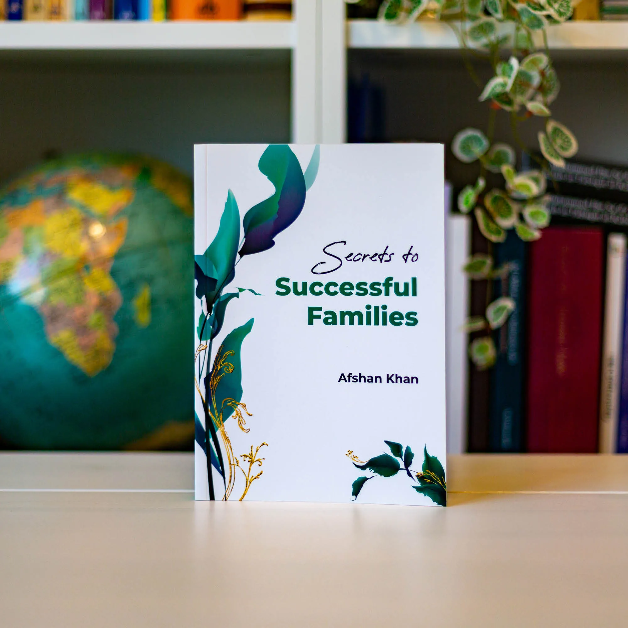Upright book in library of Secrets to Successful Families by Afshan Khan. Islamic family guide by Ta-Ha Publishers