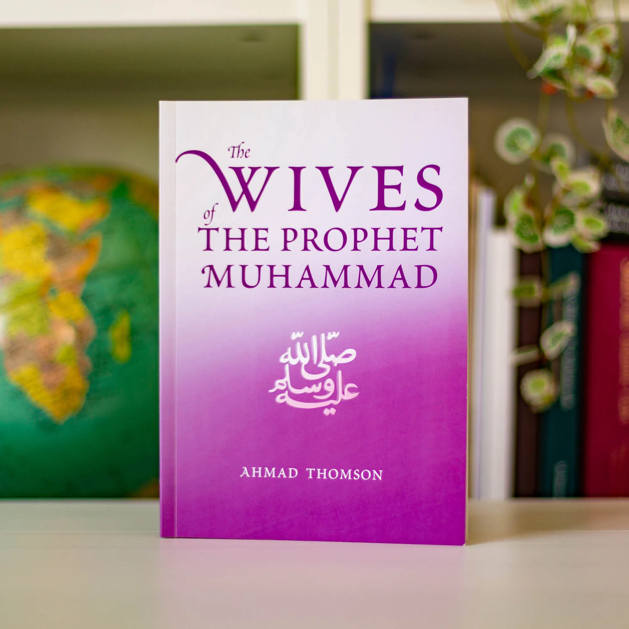 Upright book in library of The Wives of the Prophet Muhammad by Ahmed Thomson. Prophet’s wives biography by Ta-Ha Publishers