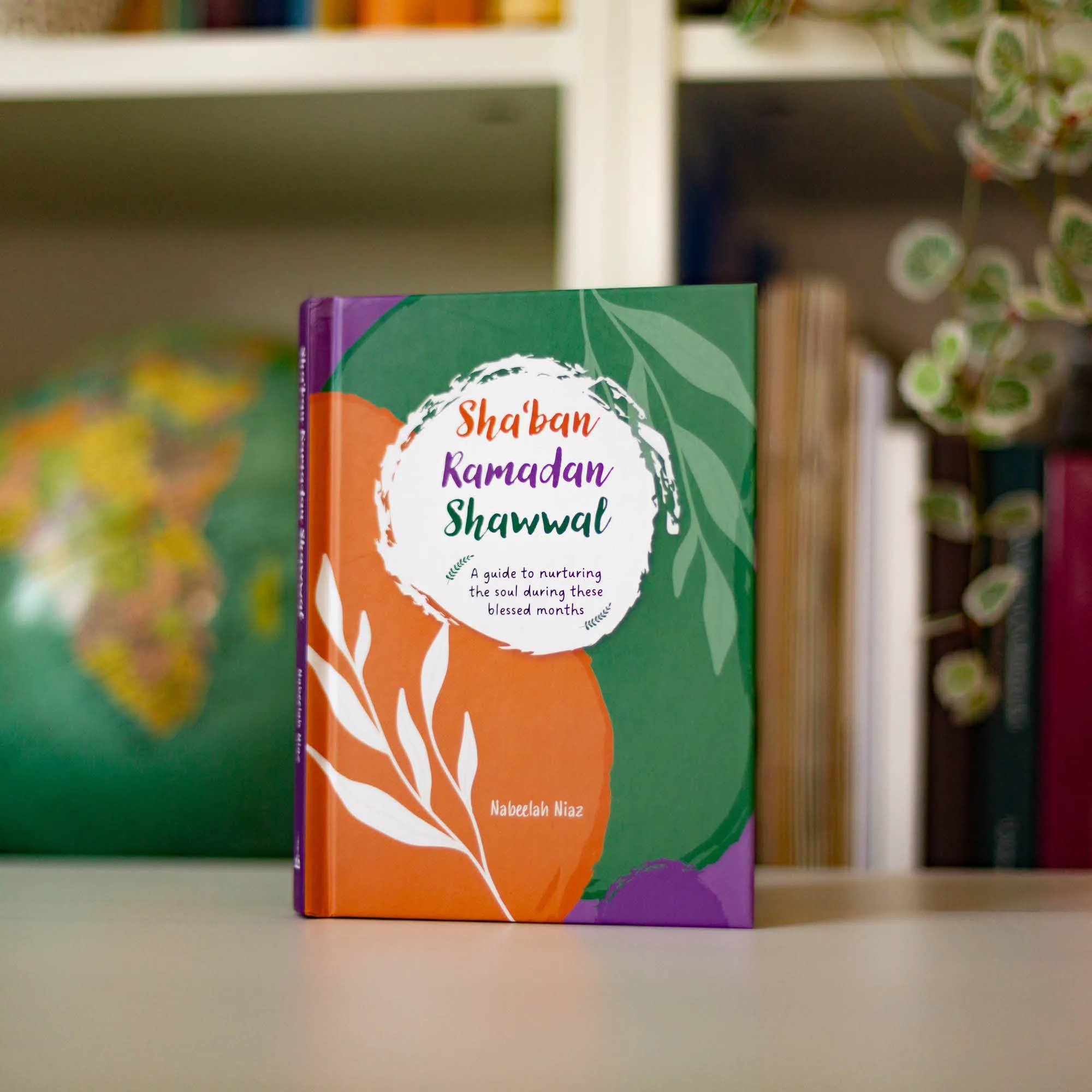 Upright book in library of Sha‘ban, Ramadan, Shawwal by Nabeelah Niaz. Ramadan guide for women by Ta-Ha Publishers